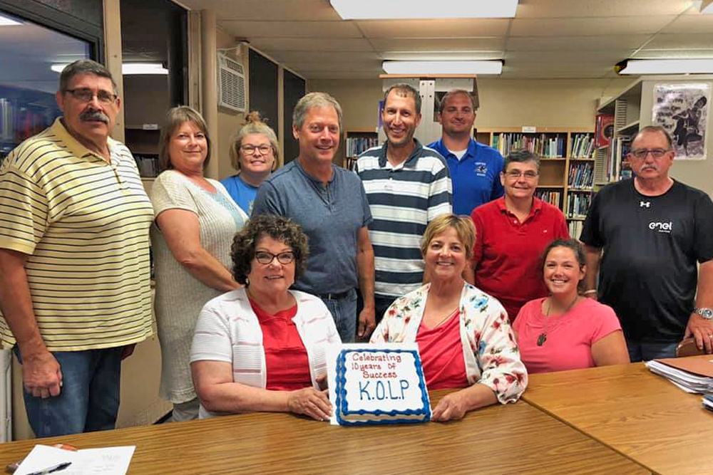 Photo of Kansas Online Learning Program employees celebrating 10 years of success